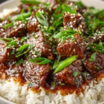 Instant Pot Beef Teriyaki dish with glossy sauce and vegetables served in a bowl