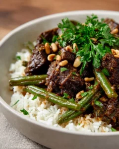 Delicious Middle Eastern beef stew garnished with herbs and spices.