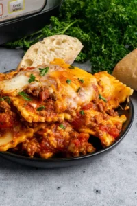 Delicious slow cooker lasagna with ravioli served on a plate