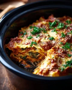 Super Easy Skinny Veggie Crockpot Lasagna cooked in a crockpot with fresh vegetables.