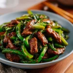 Colorful Pork and Pepper Stir-fry with vegetables in a skillet