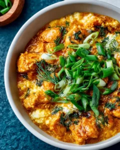 Delicious Baked Buffalo Chicken Dip served in a bowl with tortilla chips
