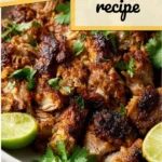 Authentic carnitas dish with tender, flavorful pork served with toppings