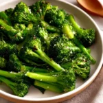 Plate of easy sauteed broccoli with garlic and lemon.