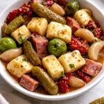 Delicious easy marinated cheese appetizer served on a platter