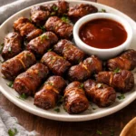 Slow Cooker Bacon Wrapped Lil' Smokies served as a delicious appetizer
