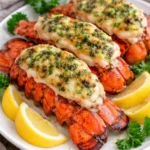 Deliciously broiled lobster tails served with lemon and herbs.