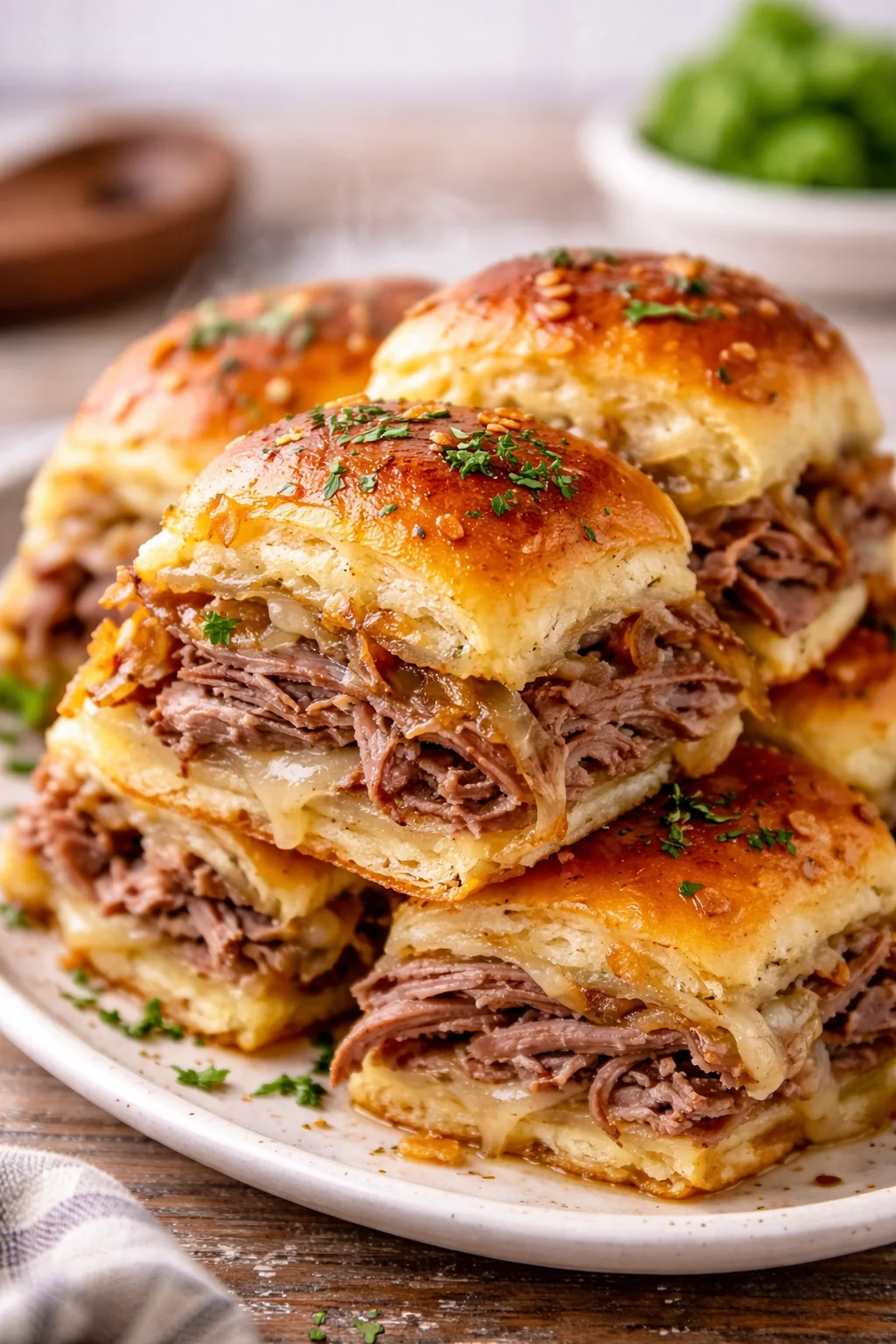 Delicious Easy French Dip Sliders served with dipping sauce