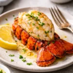 Gourmet fancy lobster tails elegantly plated for a fine dining experience.