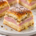 Delicious ham and cheese sliders served on a platter