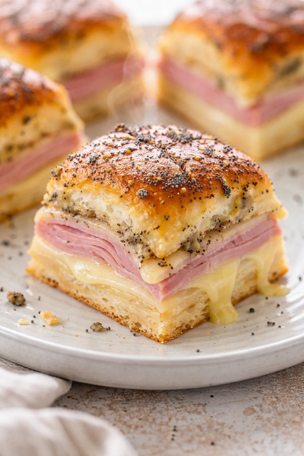 Delicious ham and cheese sliders served on a platter