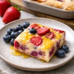 Delicious baked yogurt dessert topped with fruits and nuts