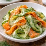 Fresh Carrot Cucumber Salad with colorful ribbons in a bowl