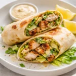 Chicken Caesar Wrap with grilled chicken, romaine lettuce, and Caesar dressing