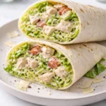 Chopped Chicken Caesar Salad Wrap with fresh ingredients and Caesar dressing