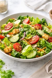 Classic house salad with fresh greens and colorful vegetables