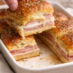 Image of homemade ham and cheese sliders with melted cheese