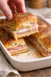 Image of homemade ham and cheese sliders with melted cheese
