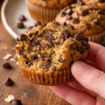 Healthy peanut butter banana muffins on a wooden table