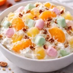 Colorful Marshmallow Ambrosia Fruit Salad with fresh fruits and fluffy marshmallows.