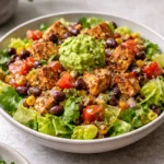 Delicious Santa Fe Salad with fresh vegetables and savory toppings.
