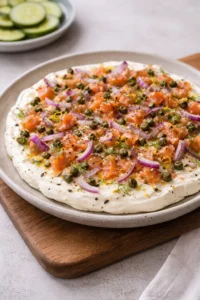 Creamy smoked salmon dip showcased on a bagel platter