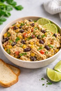 Colorful Southwest Chicken Salad with grilled chicken, beans, corn, and vegetables.
