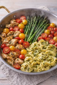 One-Pan Pesto Chicken with Tortellini and Veggies