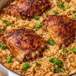 Delicious one pot chicken and rice dish served with vegetables.