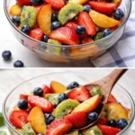 A colorful mix of fresh fruit salad including strawberries, blueberries, and kiwi.